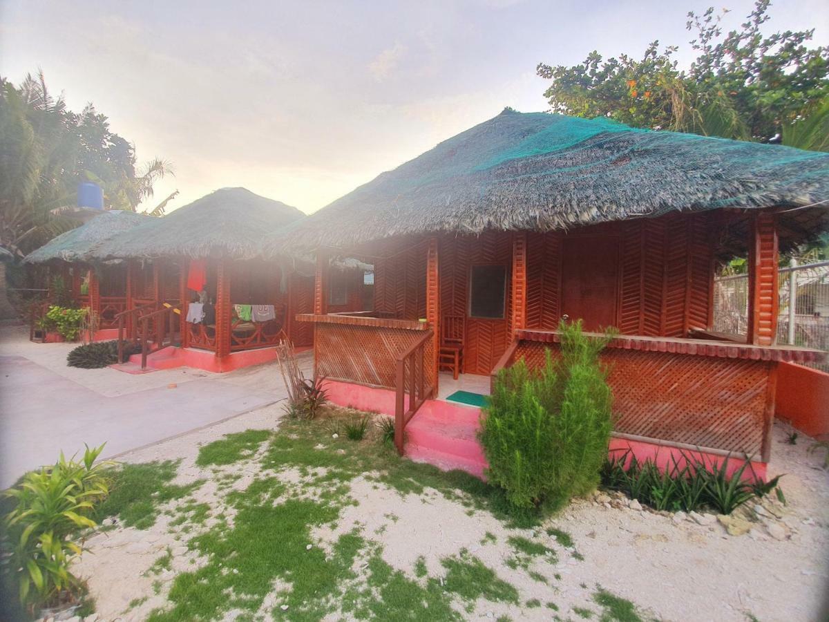 Pareja Tourist Inn Pulau Malapascua Bagian luar foto