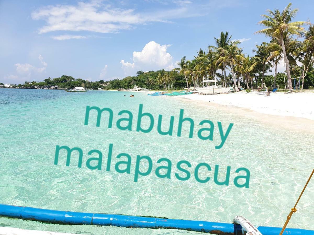 Pareja Tourist Inn Pulau Malapascua Bagian luar foto